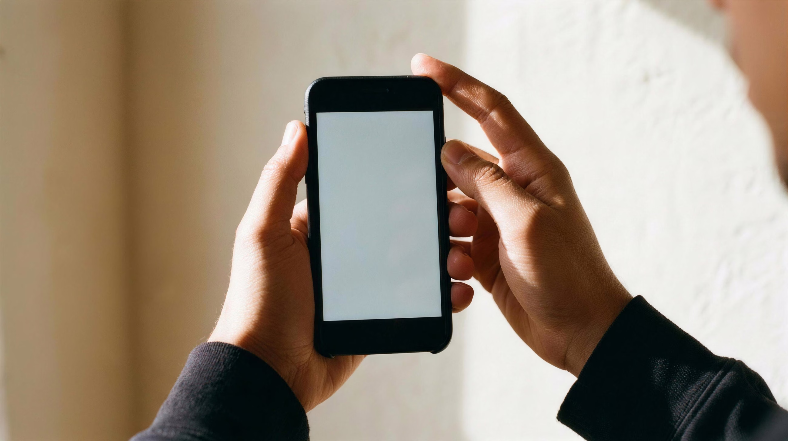 Phone In Hands, a mockup image in 16:9 format