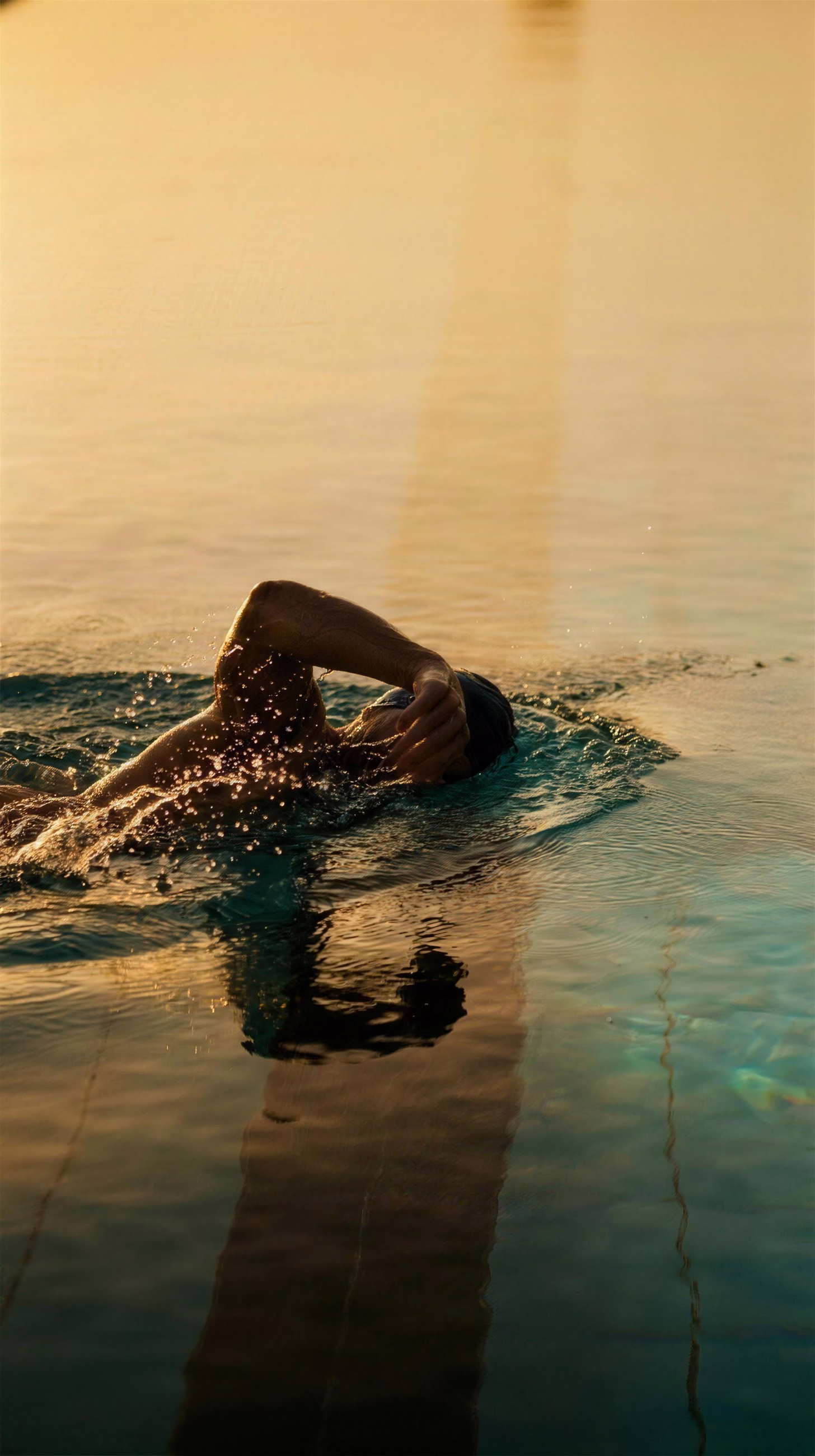 Swimmer Gold, a sport image in 9:16 format