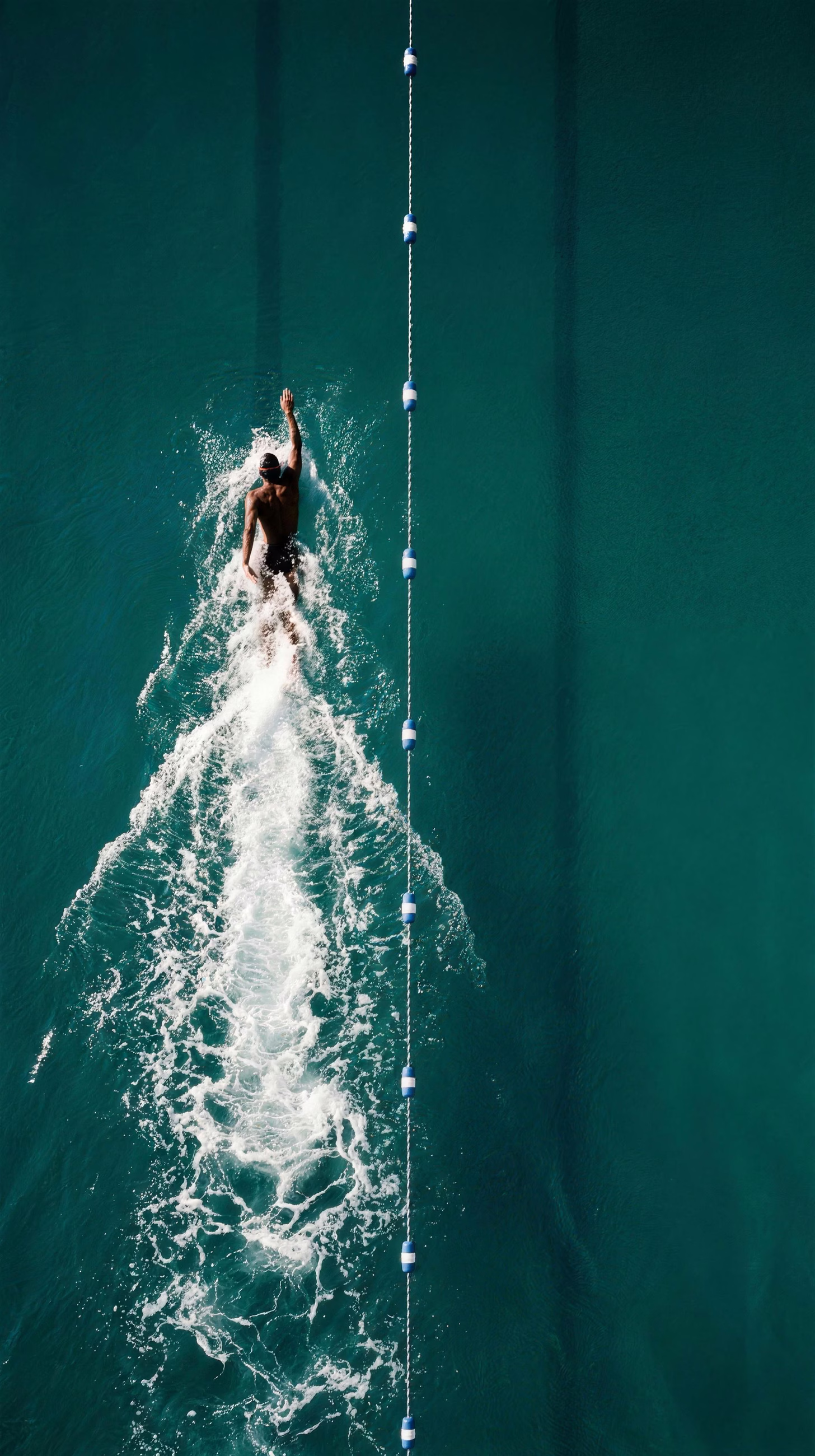 Swimmer Overhead, a graphic image in 9:16 format